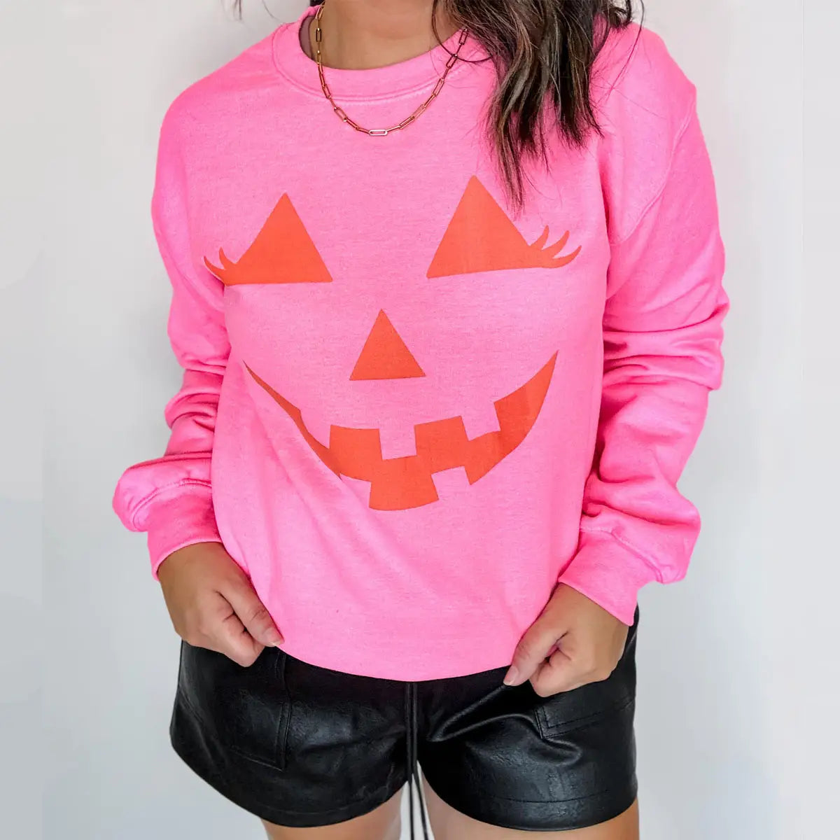 Neon Pink Pumpkin Face Sweatshirt